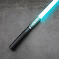Glimmer - Green lightsaber with ignited cyan blade on grey studio background