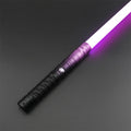 Spark - Purple lightsaber with ignited purple blade on grey studio background
